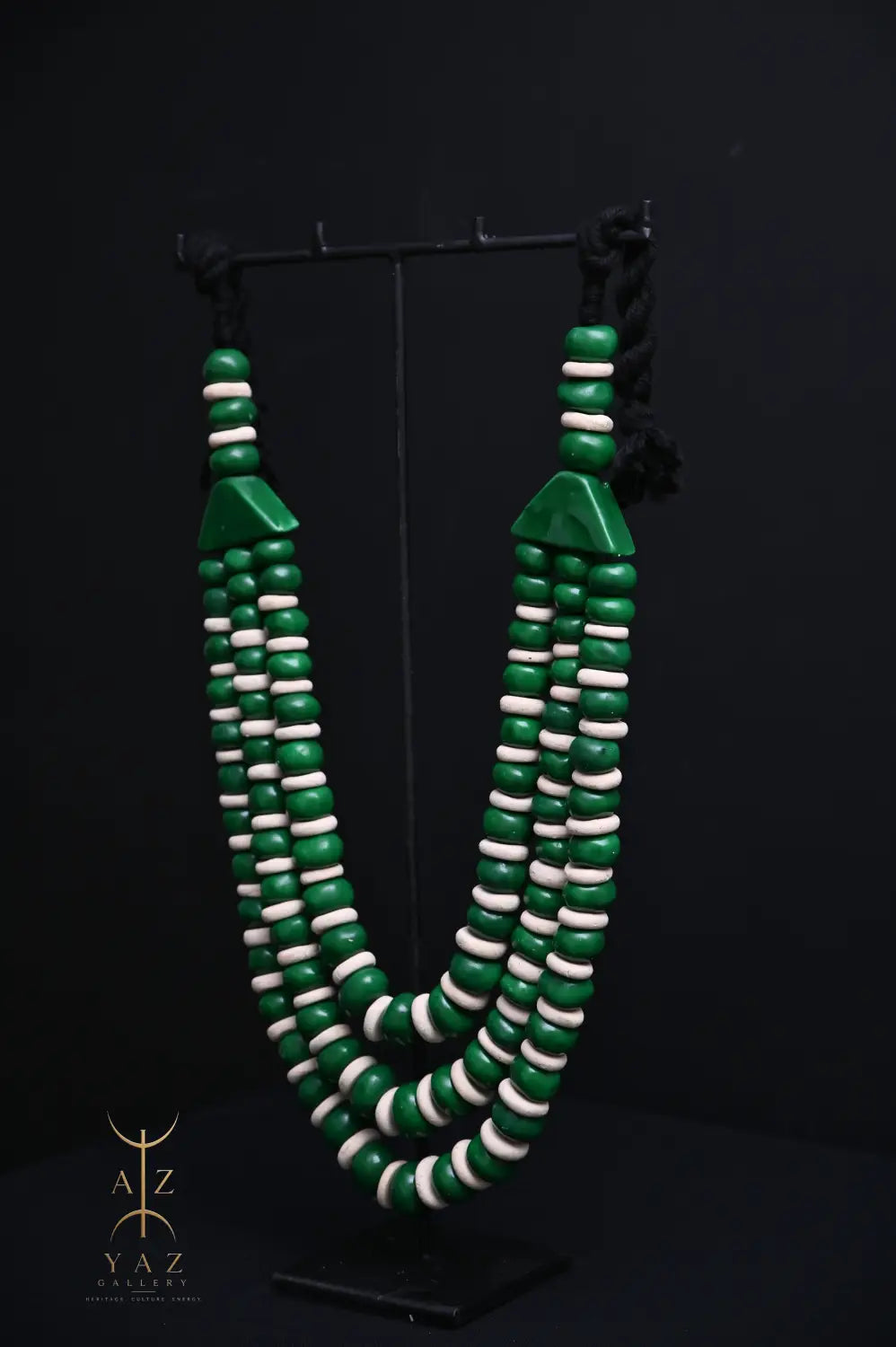 Emerald Harmony Pendant Sculpture – Green & Ivory Beads with Black Rope on Black Stand (62 × 34 cm)