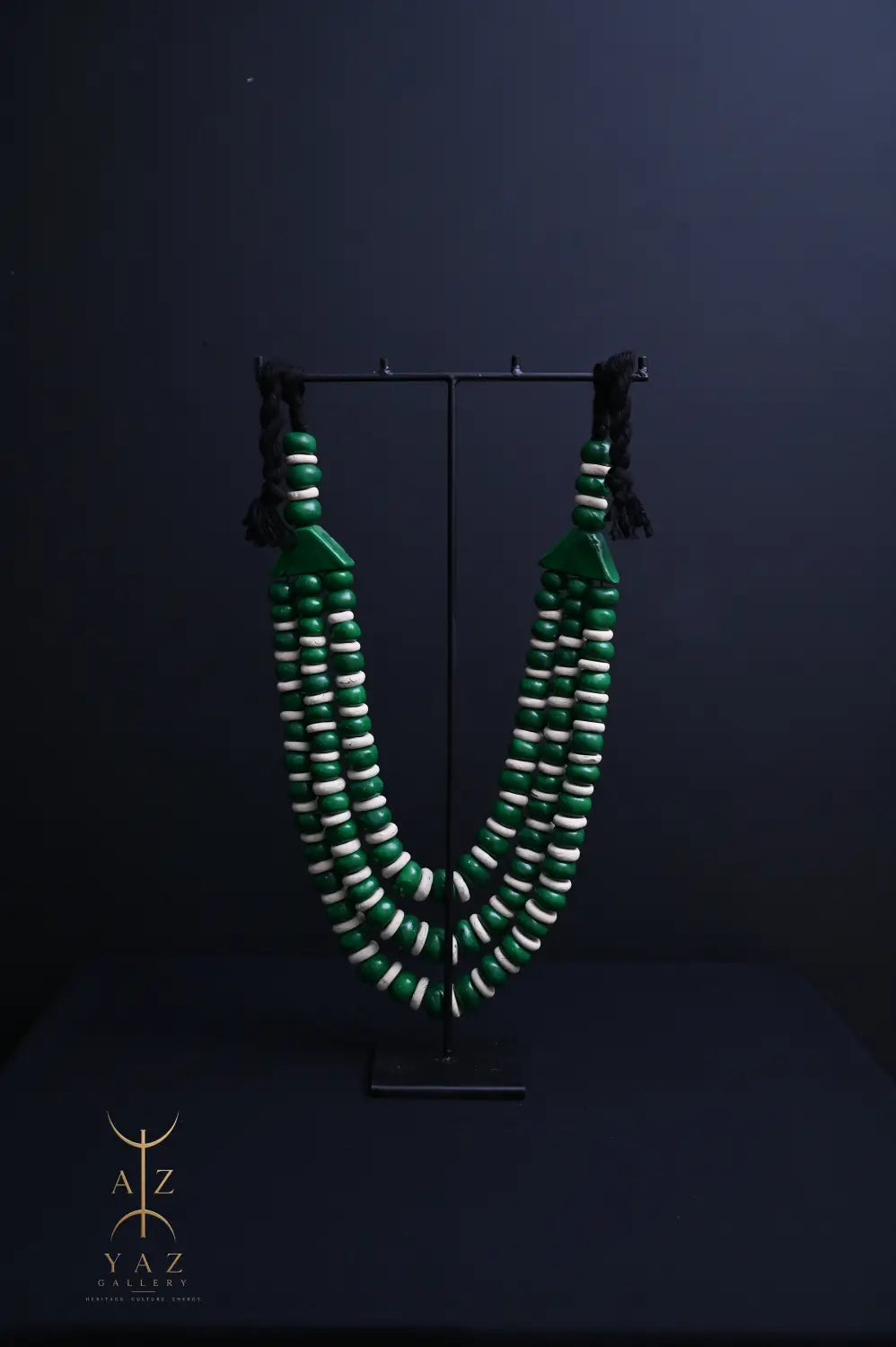 Emerald Harmony Pendant Sculpture – Green & Ivory Beads with Black Rope on Black Stand (62 × 34 cm)