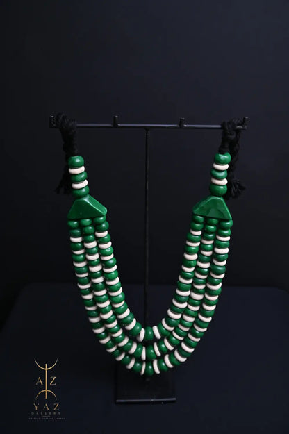 Emerald Harmony Pendant Sculpture – Green & Ivory Beads with Black Rope on Black Stand (62 × 34 cm)