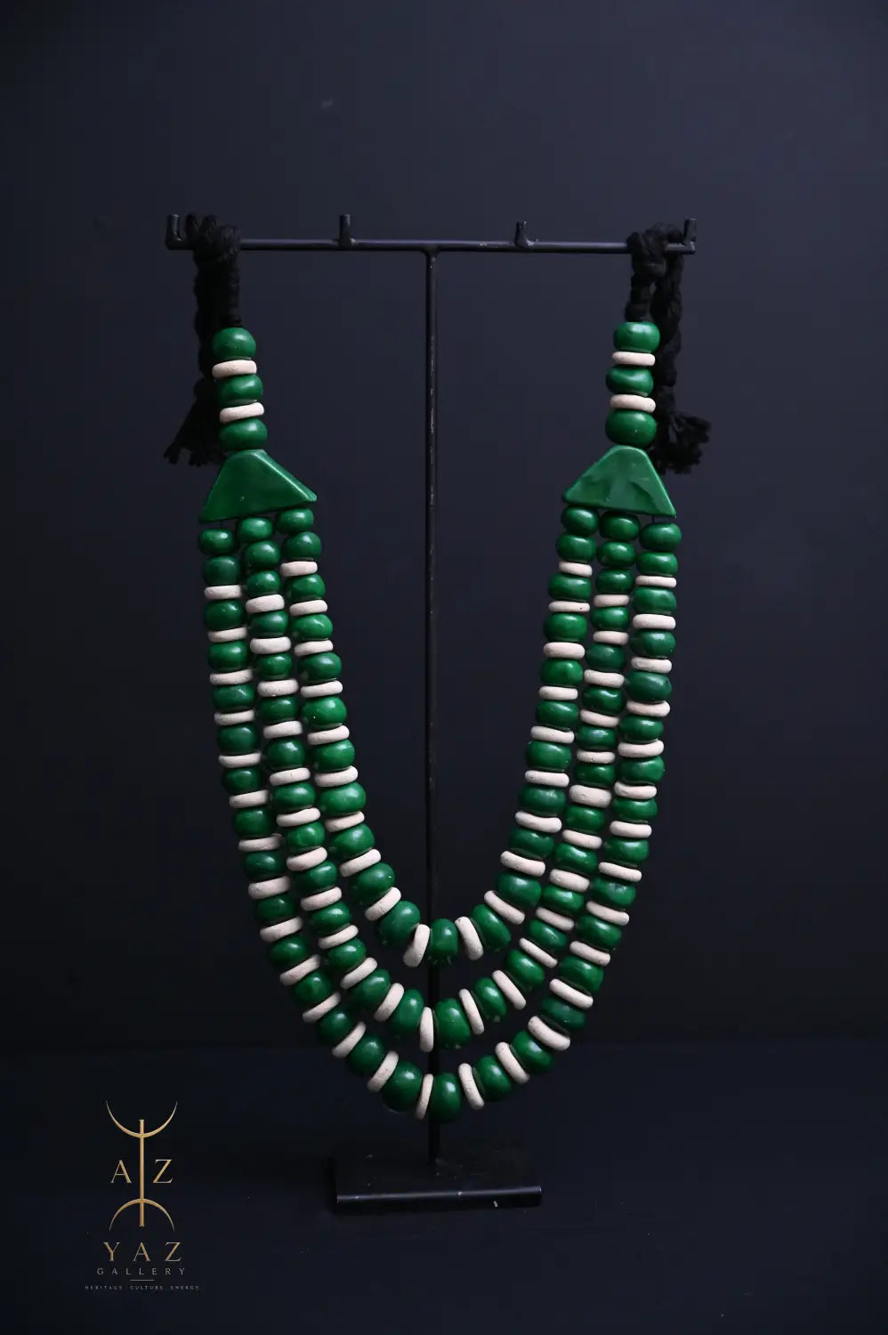 Emerald Harmony Pendant Sculpture – Green & Ivory Beads with Black Rope on Black Stand (62 × 34 cm)