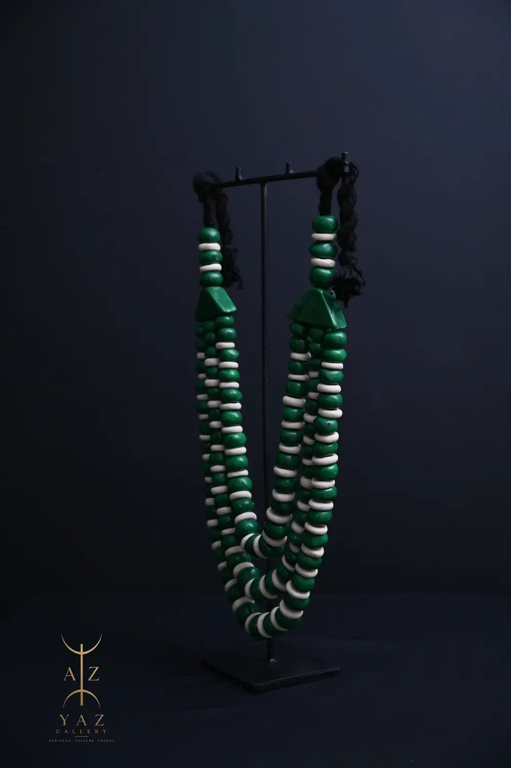 Emerald Harmony Pendant Sculpture – Green & Ivory Beads with Black Rope on Black Stand (62 × 34 cm)