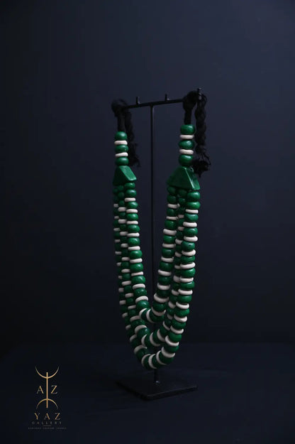 Emerald Harmony Pendant Sculpture – Green & Ivory Beads with Black Rope on Black Stand (62 × 34 cm)
