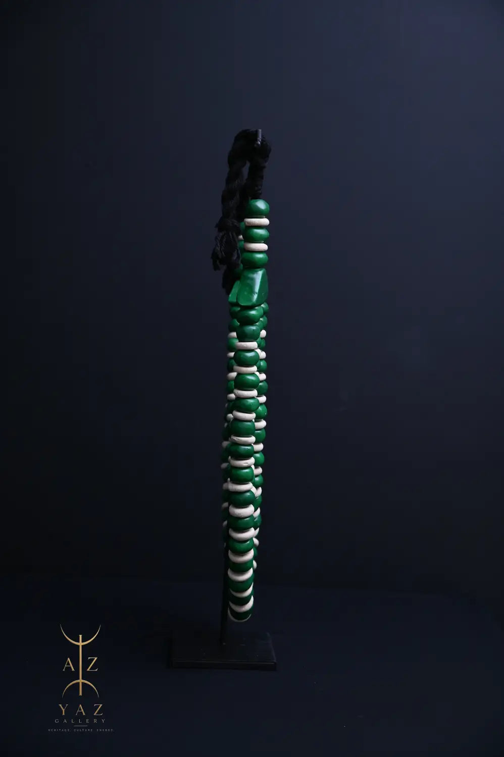 Emerald Harmony Pendant Sculpture – Green & Ivory Beads with Black Rope on Black Stand (62 × 34 cm)