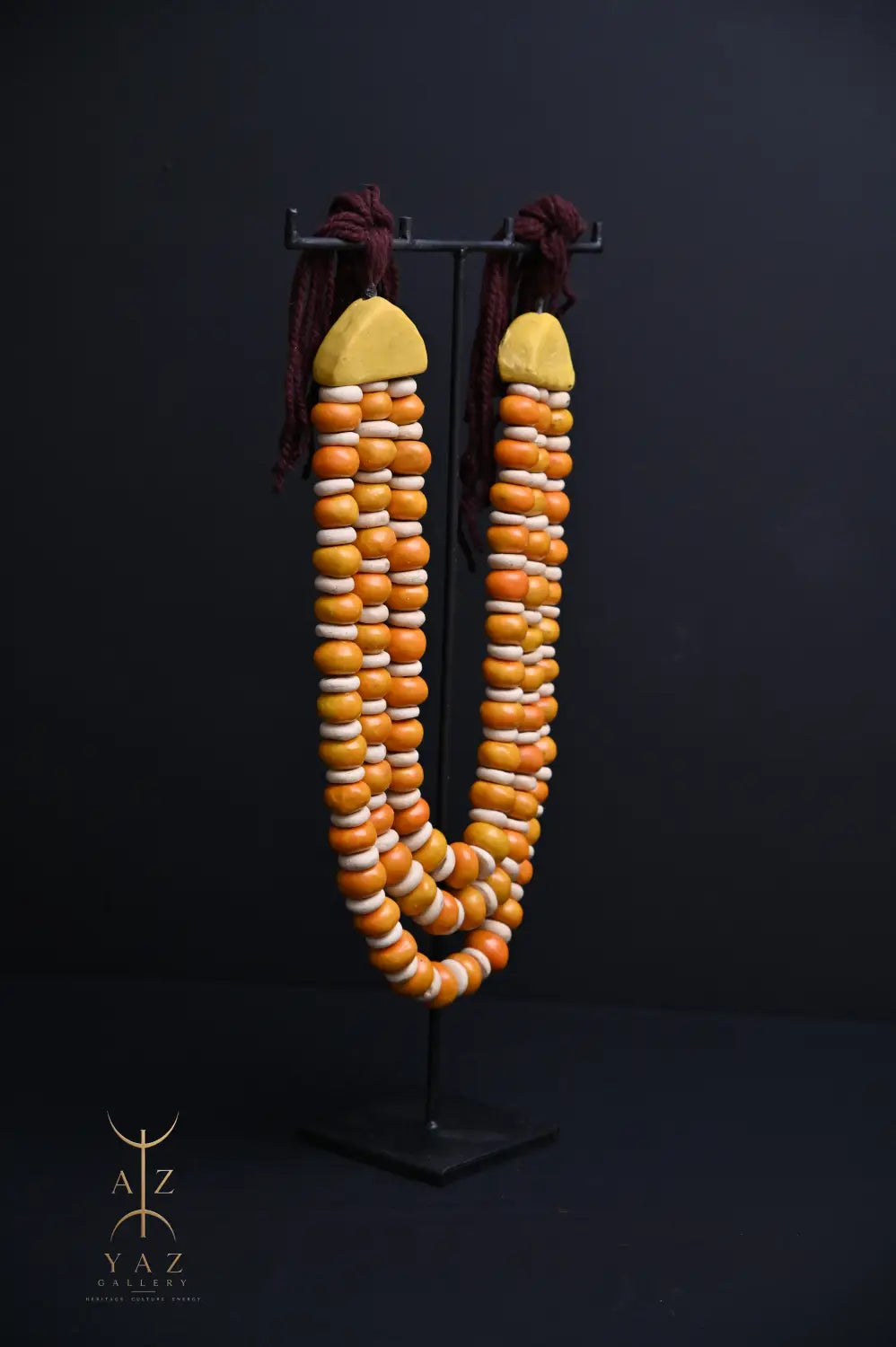Golden Ivory Nomad Pendant Sculpture – Handmade Decorative Bead Art on Black Stand (62 x 34 cm)