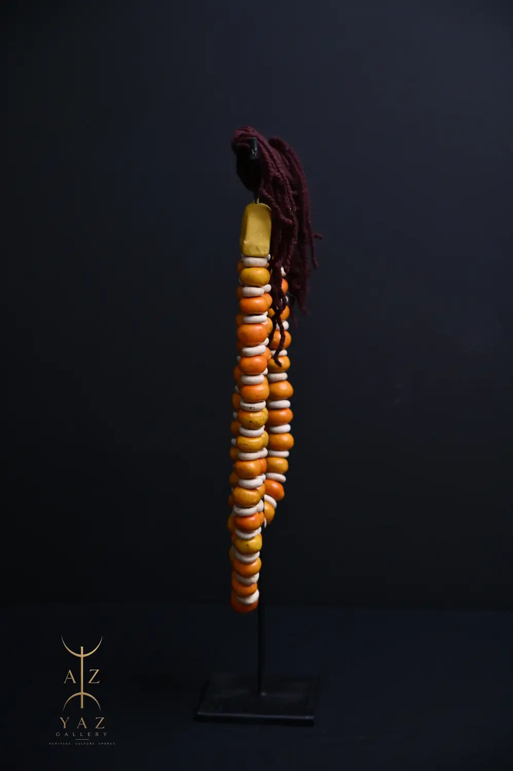 Golden Ivory Nomad Pendant Sculpture – Handmade Decorative Bead Art on Black Stand (62 x 34 cm)