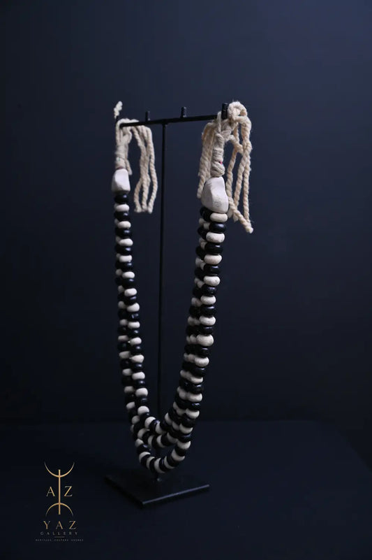 Monochrome Heritage Pendant Sculpture – Ivory & Black Beads with Ivory Rope on Black Stand (62 × 34 cm)