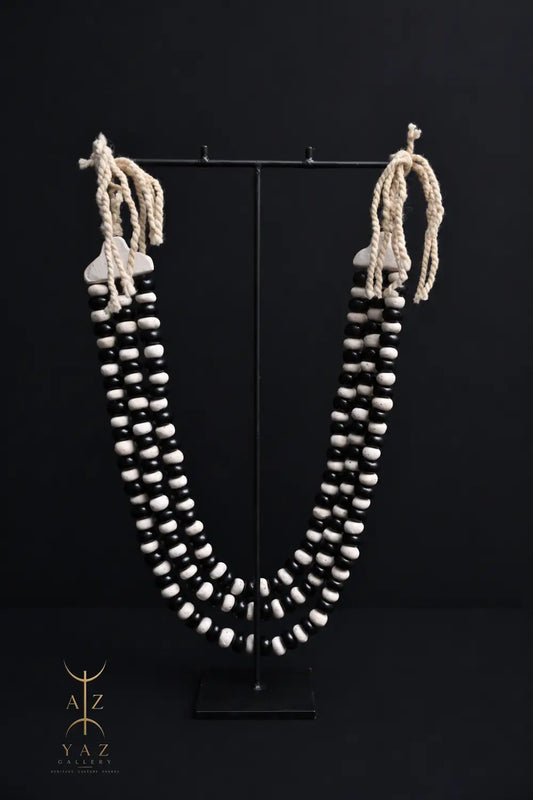 Monochrome Heritage Pendant Sculpture – Ivory & Black Beads with Ivory Rope on Black Stand (62 × 34 cm)