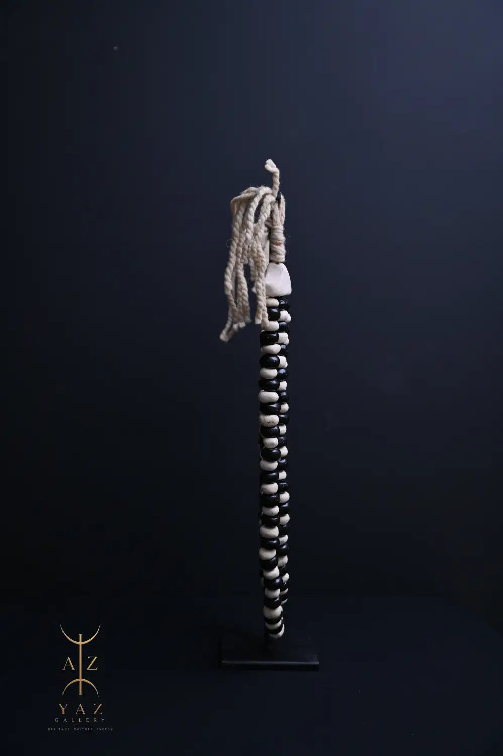 Monochrome Heritage Pendant Sculpture – Ivory & Black Beads with Ivory Rope on Black Stand (62 × 34 cm)