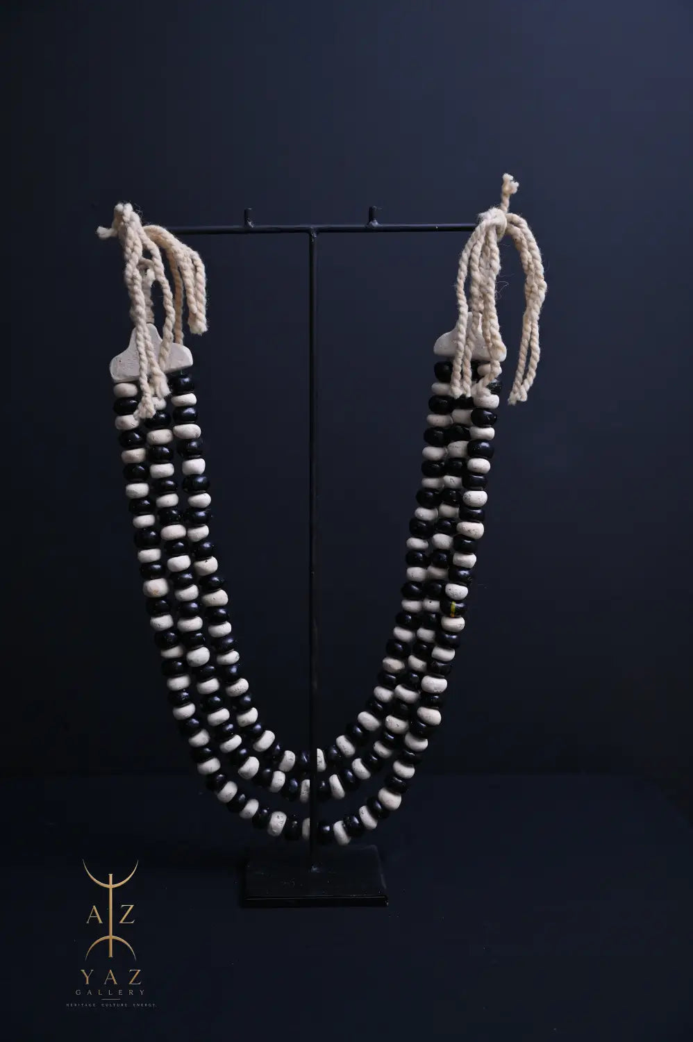 Monochrome Heritage Pendant Sculpture – Ivory & Black Beads with Ivory Rope on Black Stand (62 × 34 cm)
