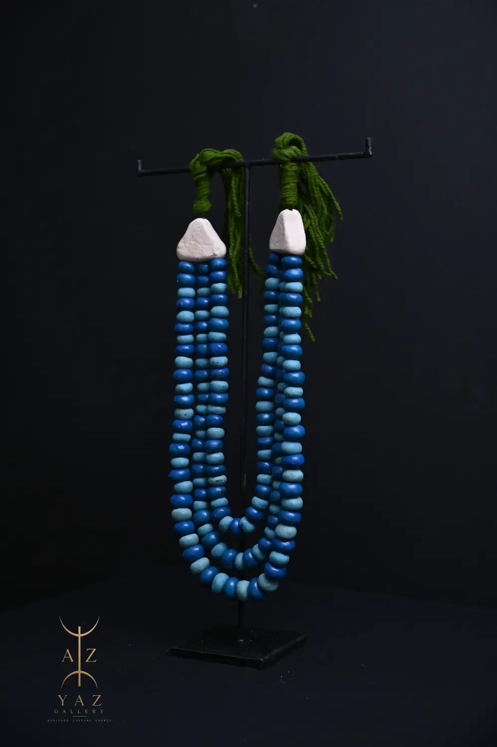 Ocean Depth Pendant Sculpture – Blue & Deep Blue Beads with Green Rope on Black Stand (62 x 34 cm)
