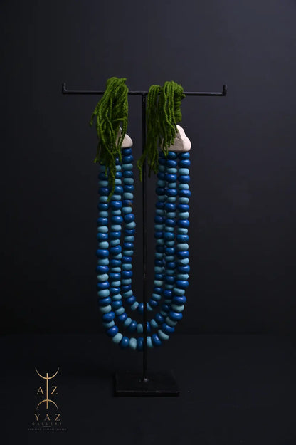 Ocean Depth Pendant Sculpture – Blue & Deep Blue Beads with Green Rope on Black Stand (62 x 34 cm)