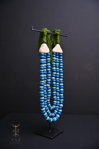 Ocean Depth Pendant Sculpture – Blue & Deep Blue Beads with Green Rope on Black Stand (62 x 34 cm)