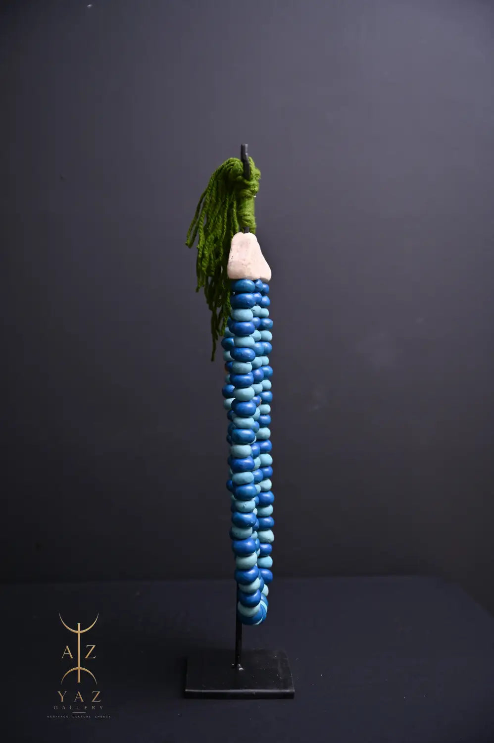 Ocean Depth Pendant Sculpture – Blue & Deep Blue Beads with Green Rope on Black Stand (62 x 34 cm)
