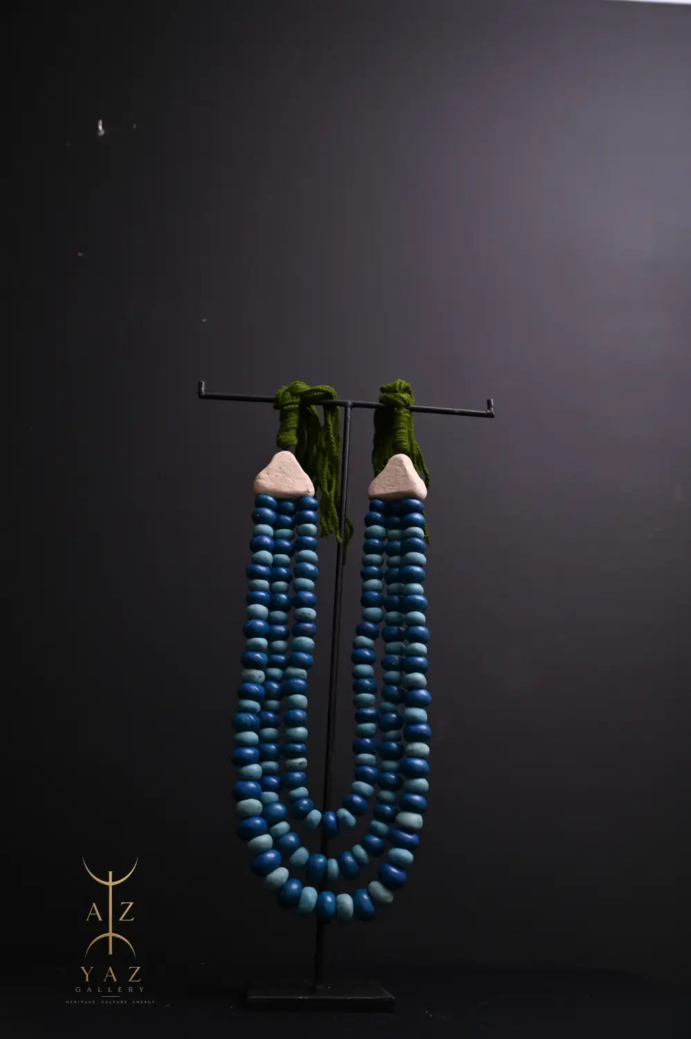 Ocean Depth Pendant Sculpture – Blue & Deep Blue Beads with Green Rope on Black Stand (62 x 34 cm)