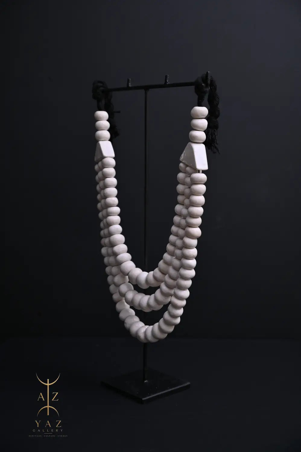 Pure Ivory Pendant Sculpture – Handcrafted White Beaded Art on Black Stand (62 x 34 cm)