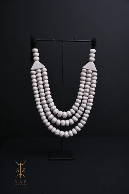 Pure Ivory Pendant Sculpture – Handcrafted White Beaded Art on Black Stand (62 x 34 cm)