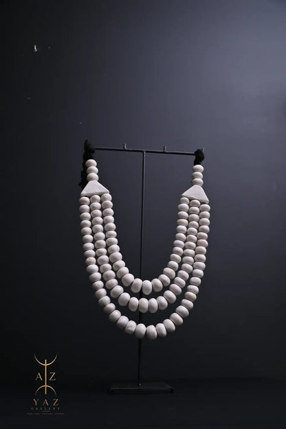 Pure Ivory Pendant Sculpture – Handcrafted White Beaded Art on Black Stand (62 x 34 cm)