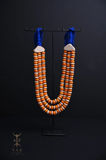 Sunset Coast Pendant Sculpture – Handcrafted Ivory & Orange Beaded Art on Black Stand (62 x 34 cm)