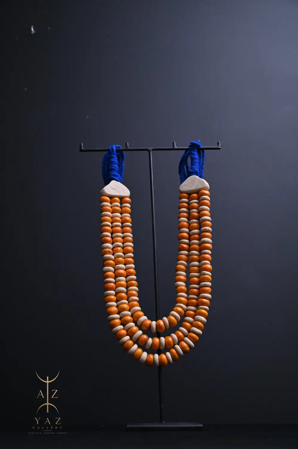 Sunset Coast Pendant Sculpture – Handcrafted Ivory & Orange Beaded Art on Black Stand (62 x 34 cm)