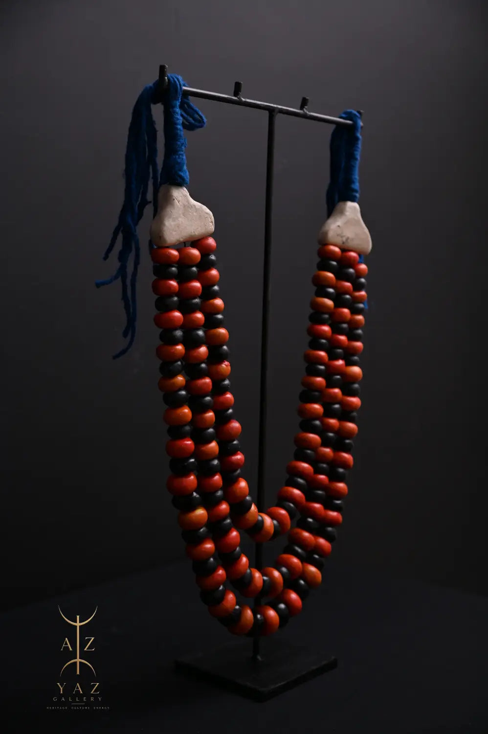Sunset Contrast Pendant Sculpture – Orange & Black Beads with Blue Rope on Black Stand (62 × 34 cm)