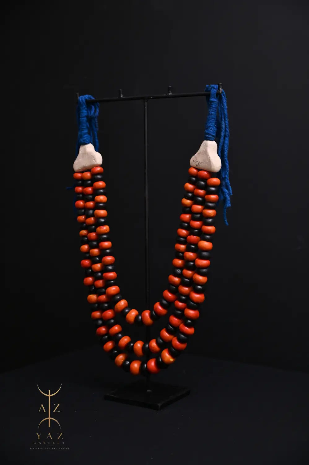 Sunset Contrast Pendant Sculpture – Orange & Black Beads with Blue Rope on Black Stand (62 × 34 cm)