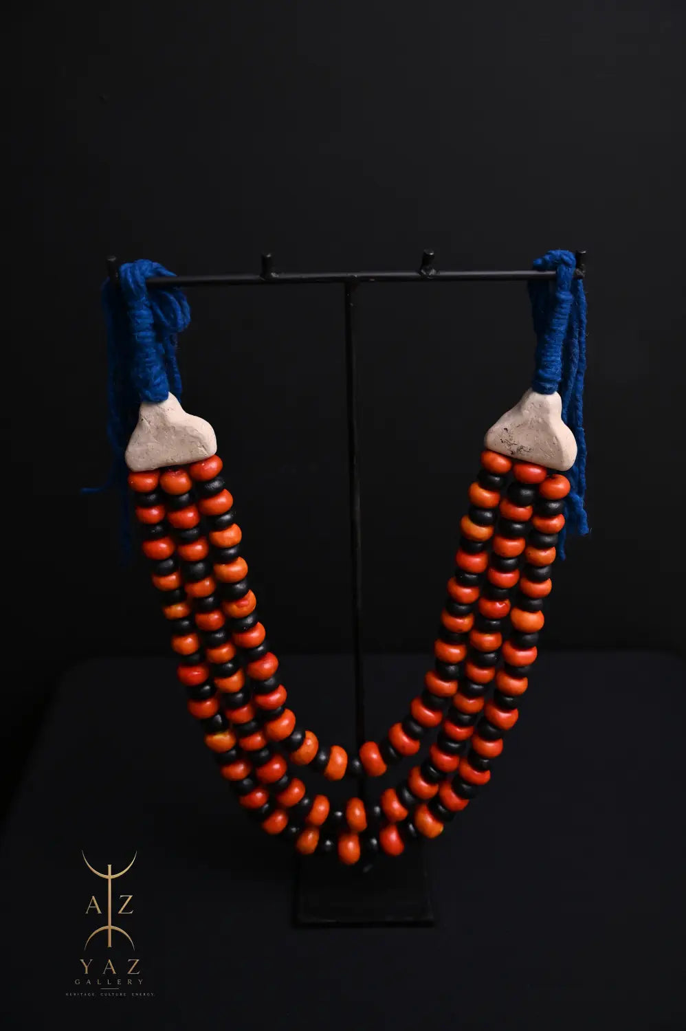 Sunset Contrast Pendant Sculpture – Orange & Black Beads with Blue Rope on Black Stand (62 × 34 cm)