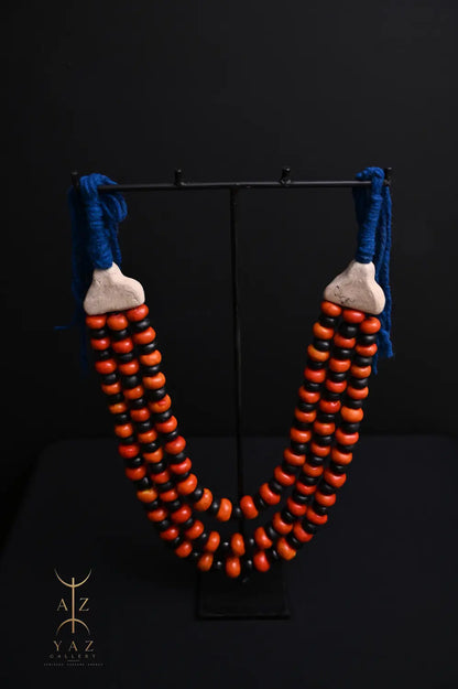 Sunset Contrast Pendant Sculpture – Orange & Black Beads with Blue Rope on Black Stand (62 × 34 cm)