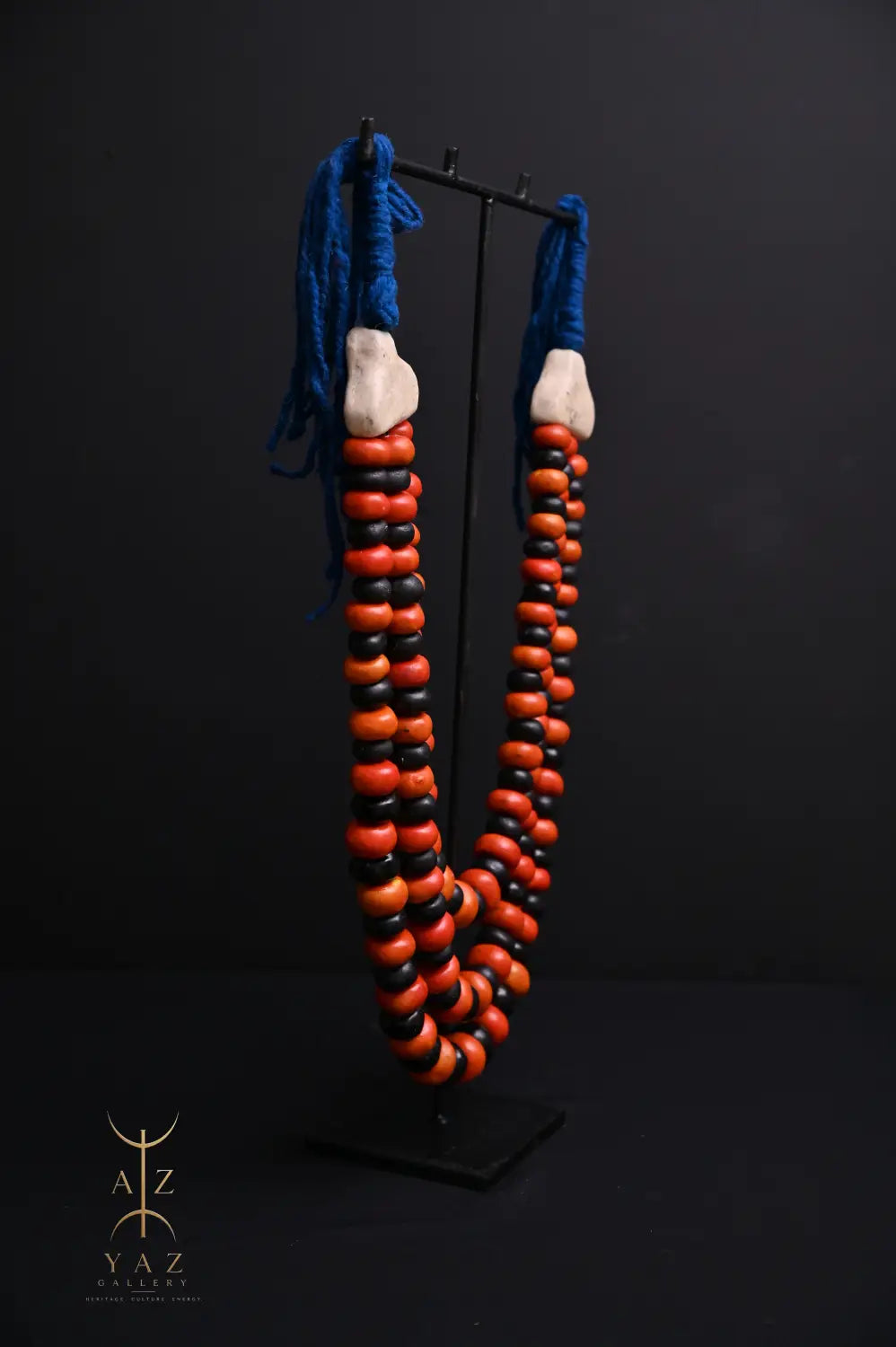 Sunset Contrast Pendant Sculpture – Orange & Black Beads with Blue Rope on Black Stand (62 × 34 cm)