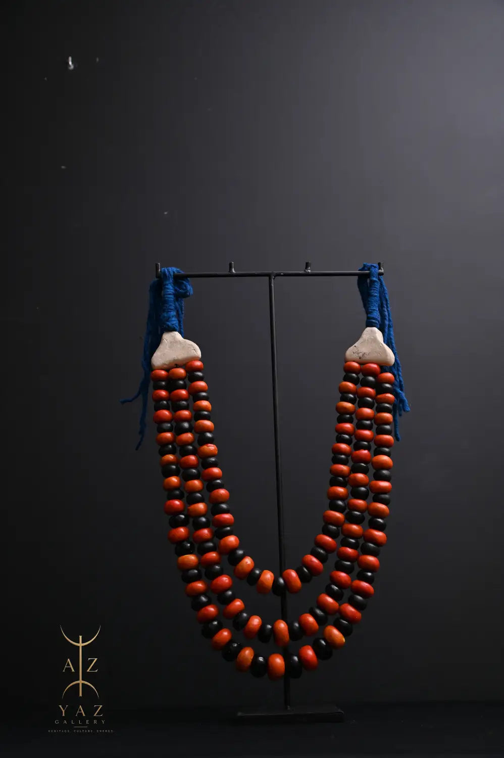 Sunset Contrast Pendant Sculpture – Orange & Black Beads with Blue Rope on Black Stand (62 × 34 cm)