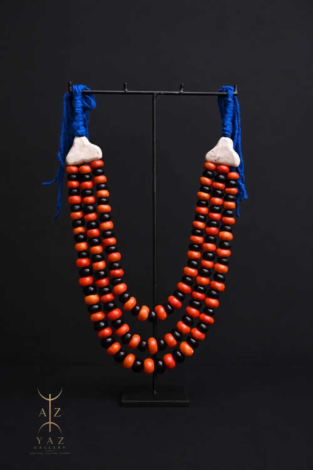 Sunset Contrast Pendant Sculpture – Orange & Black Beads with Blue Rope on Black Stand (62 × 34 cm)