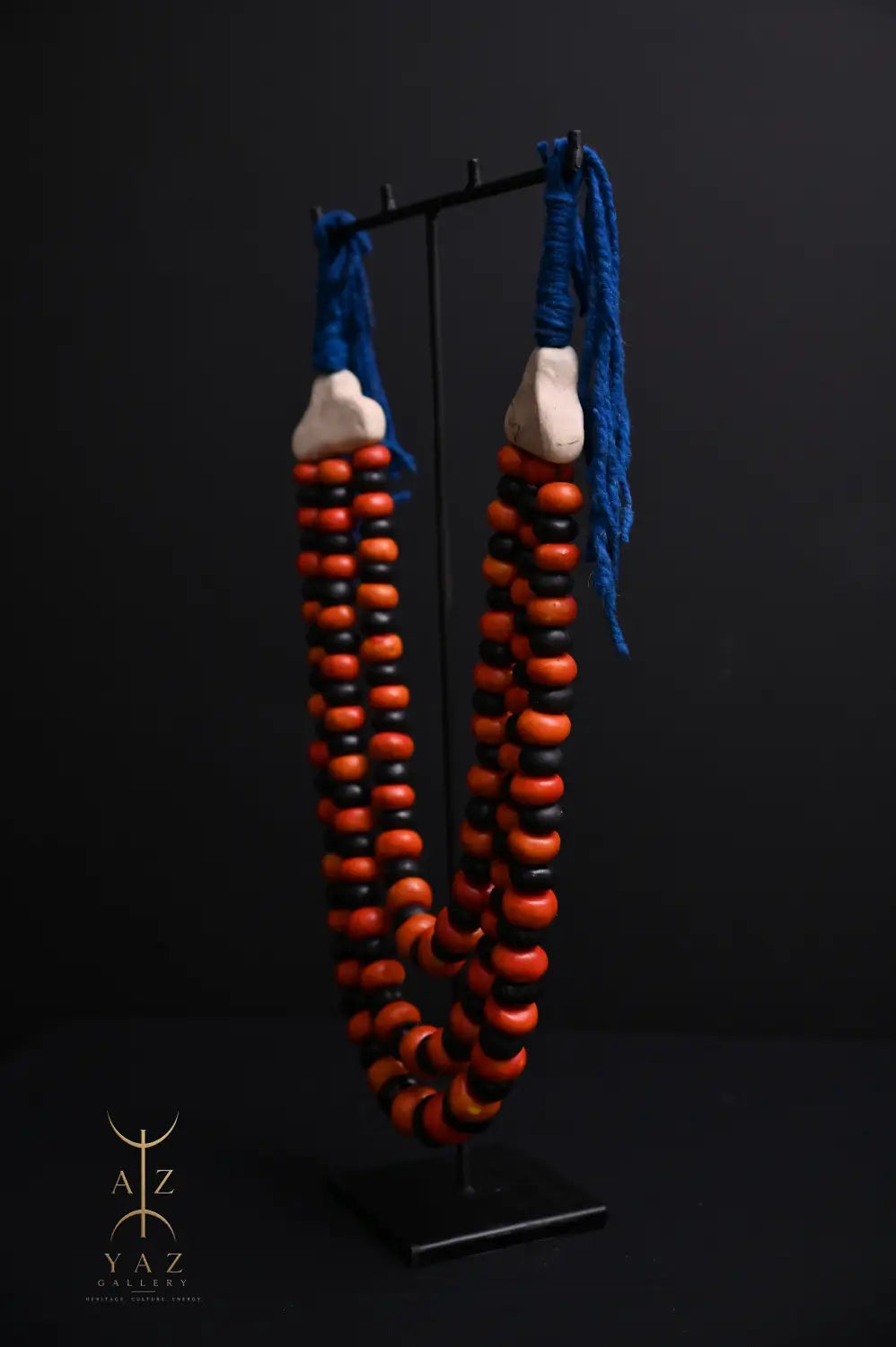Sunset Contrast Pendant Sculpture – Orange & Black Beads with Blue Rope on Black Stand (62 × 34 cm)
