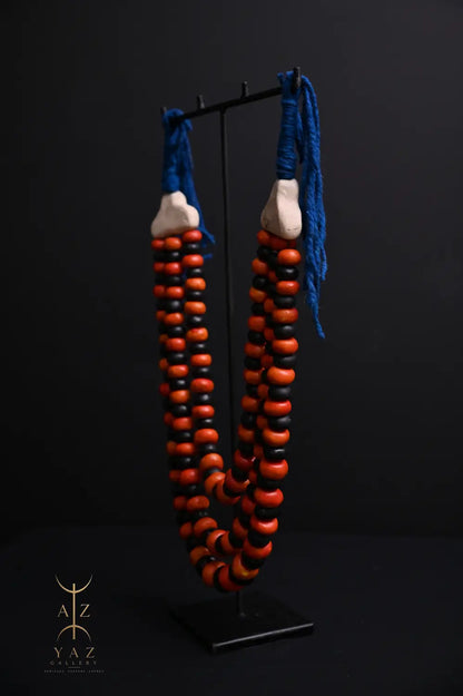 Sunset Contrast Pendant Sculpture – Orange & Black Beads with Blue Rope on Black Stand (62 × 34 cm)