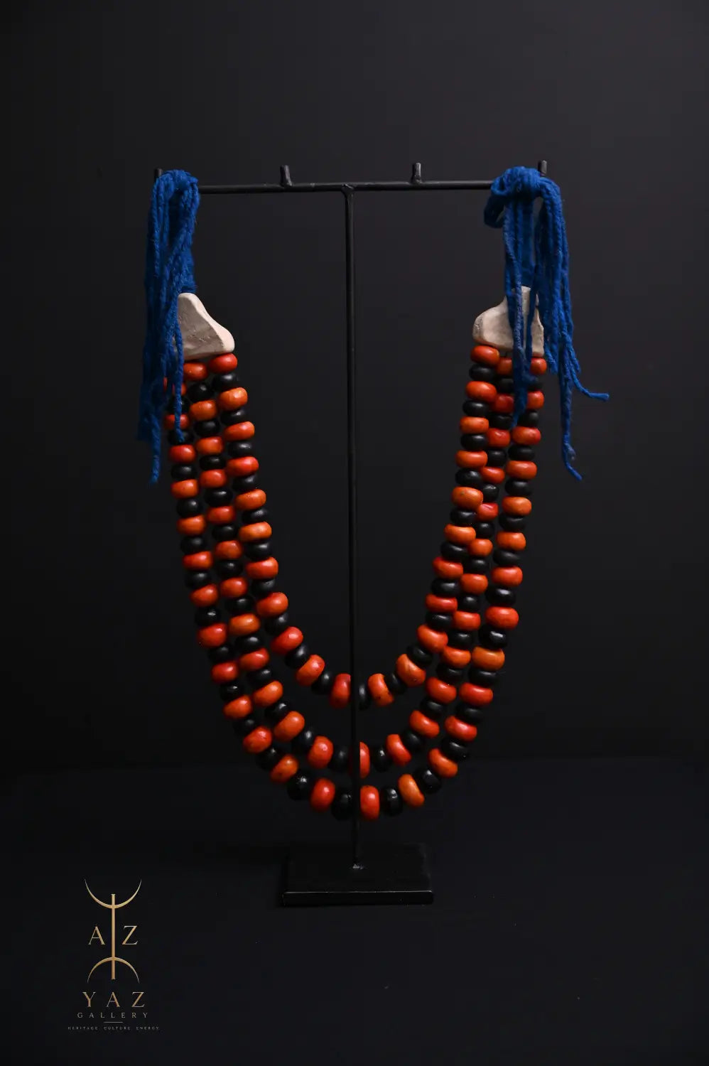 Sunset Contrast Pendant Sculpture – Orange & Black Beads with Blue Rope on Black Stand (62 × 34 cm)